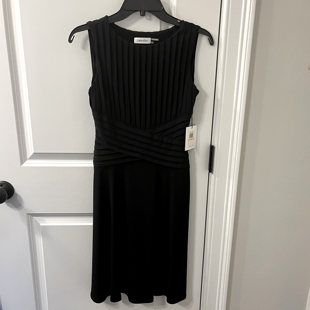 Brand new Calvin Klein Black dress. Size 2